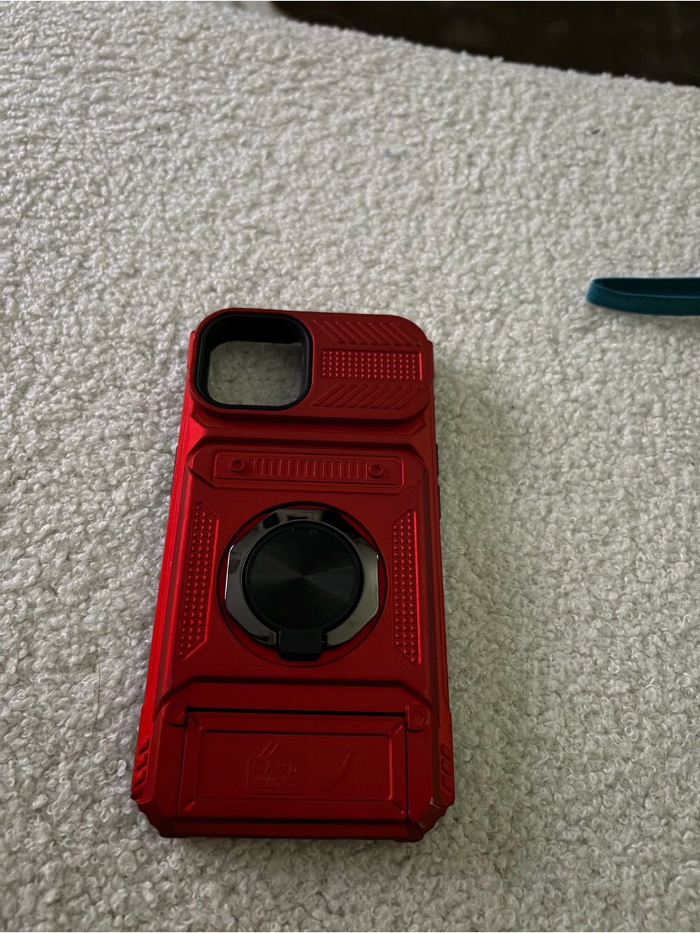 Red Rugged Phone Case with Rotating Grip
iPhone 17